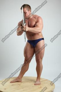 ADAM_WARD STANDING WITH KNIFE